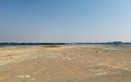 Tranquil Plot with Stunning Marina Views in Al Zorah