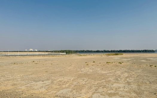 Tranquil Plot with Stunning Marina Views in Al Zorah