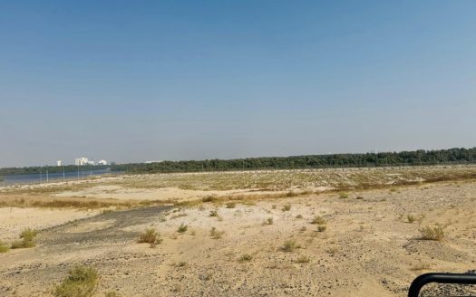 Tranquil Plot with Stunning Marina Views in Al Zorah